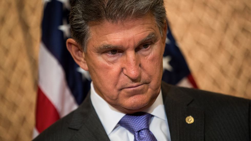 VP Mike Pence CARPET-BOMBS 'moderate' Joe Manchin's liberal voting record