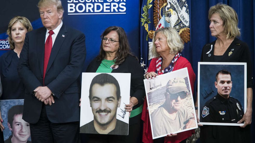 Parents of kids killed by illegal immigrants: We ASKED Trump to sign photos of our children