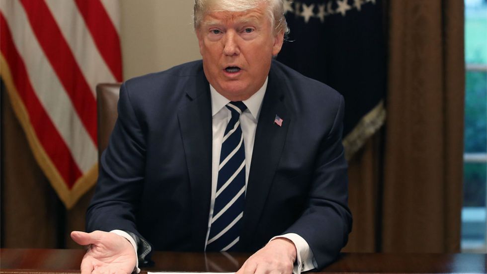 Journalists accuse Trump of blowing 'dog whistle' in South Africa land seizure tweet