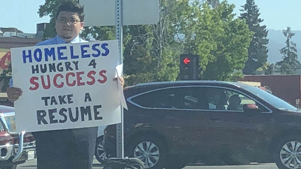 Homeless man's bold 'hungry' sign results in hundreds of job offers