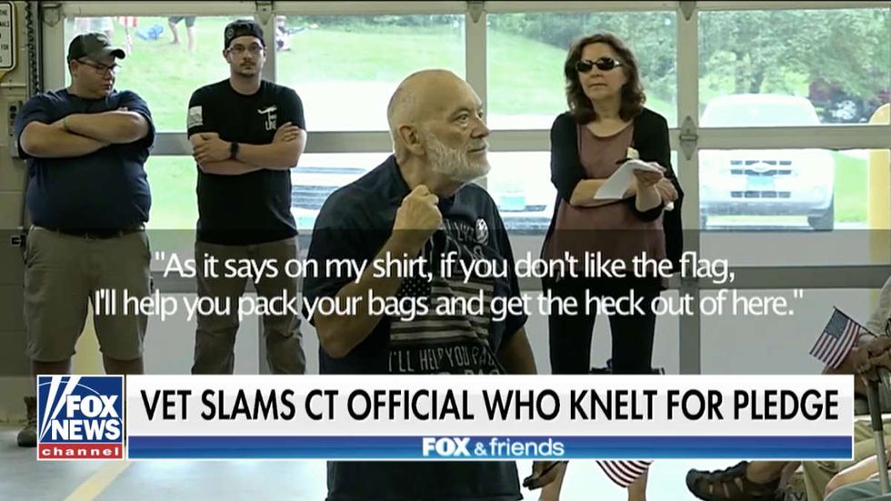 WATCH: Furious war vet confronts official who kneeled during Pledge of Allegiance