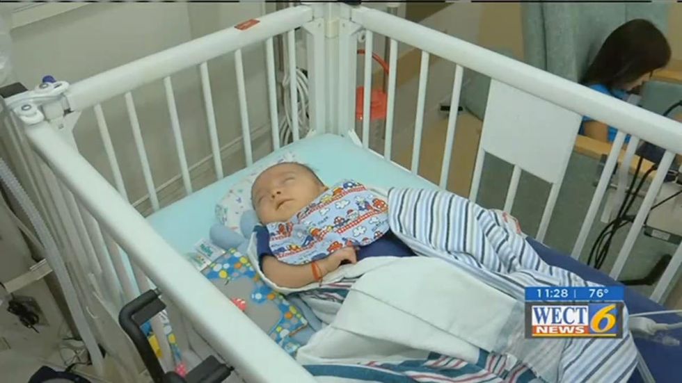 'Fighting miracle': Premature NICU baby who died twice in operating room goes home
