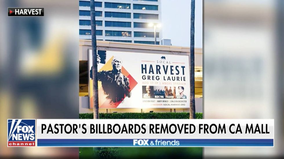Southern California malls remove billboard with image of Bible