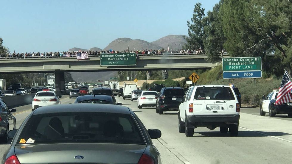 Video: People pack freeway overpasses to honor fallen hero Sgt. Ron Helus