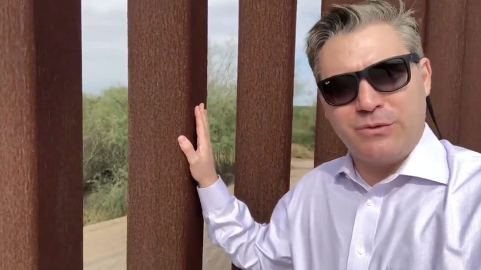 'One of the biggest self-owns ever': Jim Acosta says there's no emergency on the border while standing next to the wall