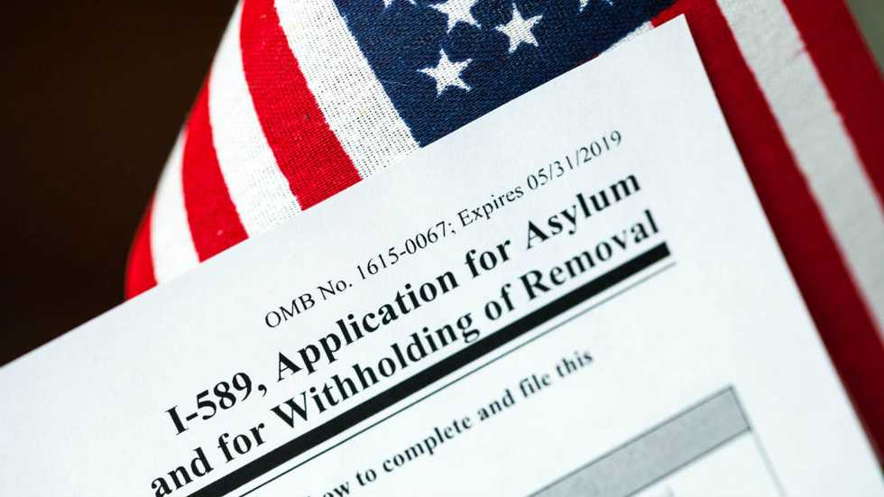 Horowitz: As ordinary citizen life grinds to halt, government still flying in refugees from around the world