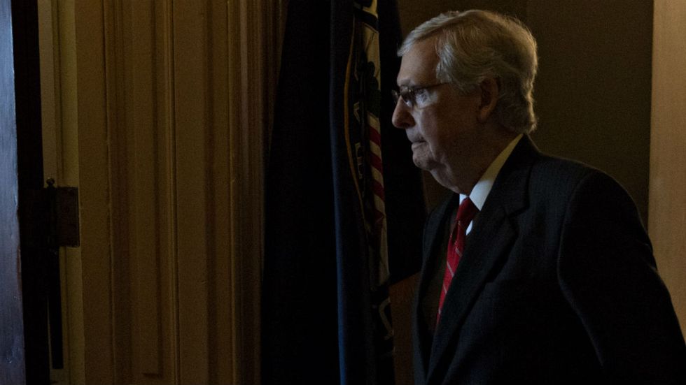 McConnell says he’ll put a gun bill on the Senate floor, but only if Trump gets behind it