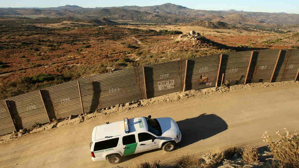 Border Patrol agents rescue three Mexican nationals stuck on top of San Diego border wall