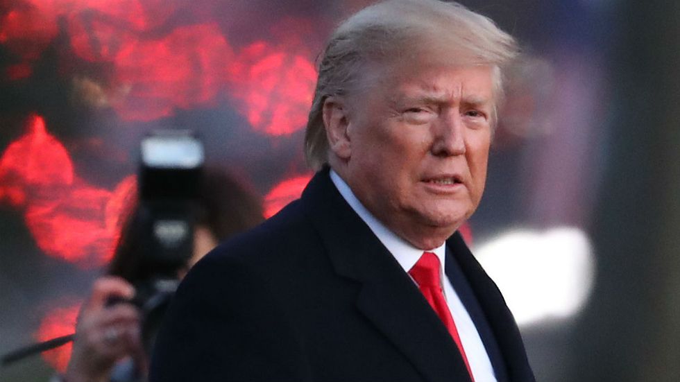 The House impeaches President Trump in partisan vote