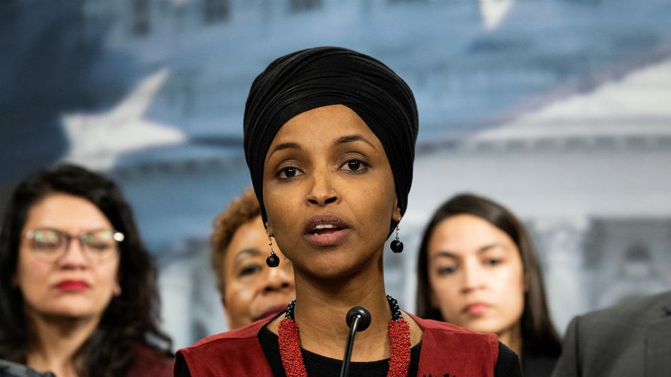 Omar giggles while colleague discusses US troop deaths