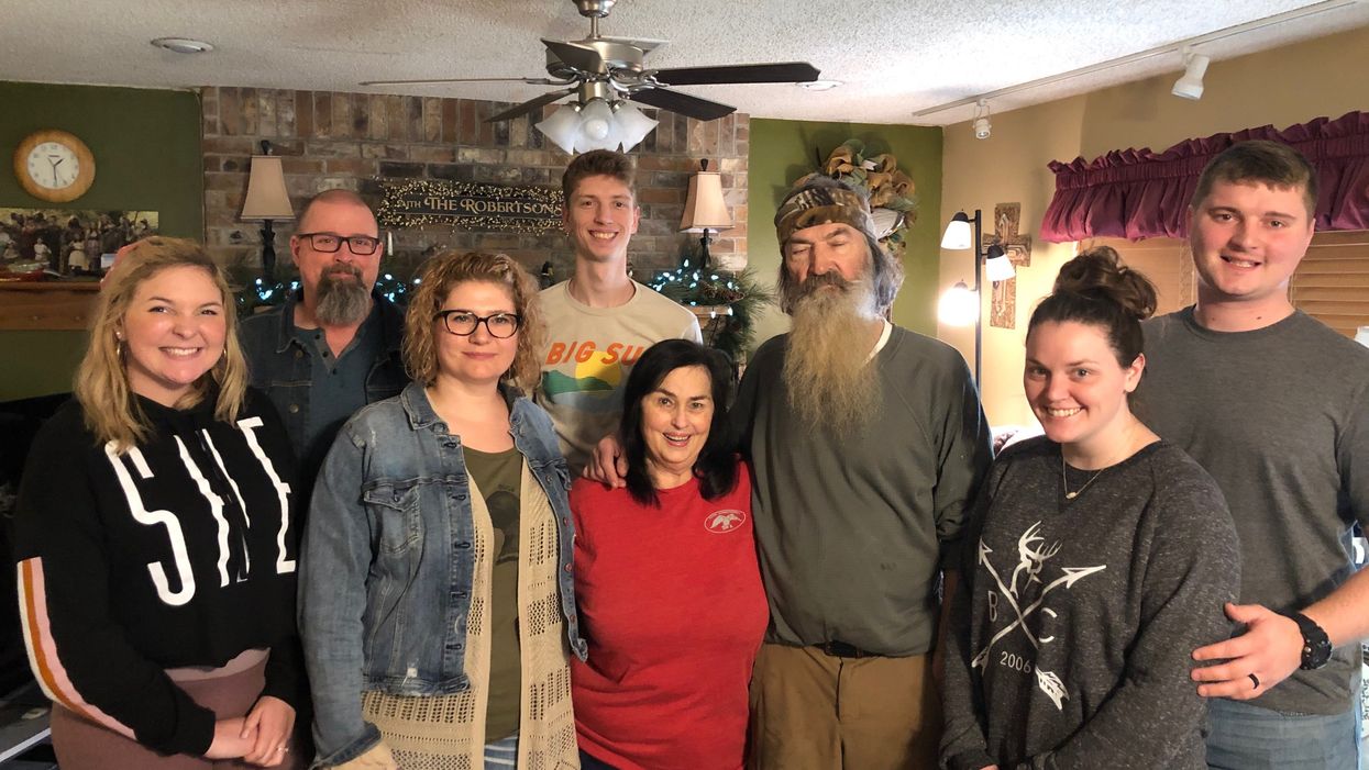 Phil Robertson has a daughter he never met. Go inside the emotional reunion.