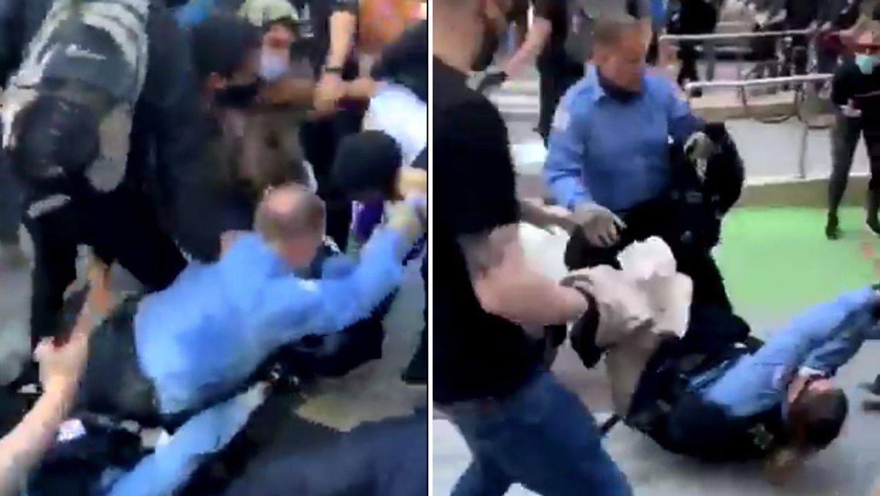 Shocking video shows violent protesters drag Chicago police officers through street