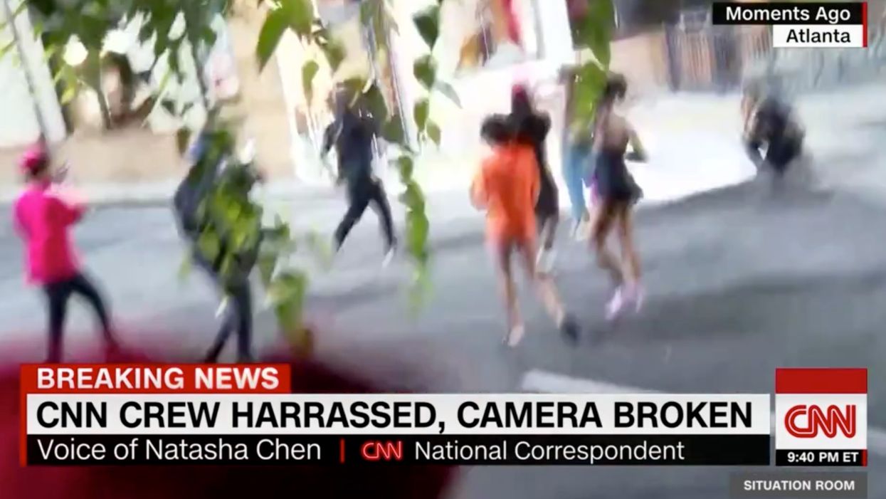 Video shows rioting protesters attack CNN camera crew for recording them destroying a Wendy's
