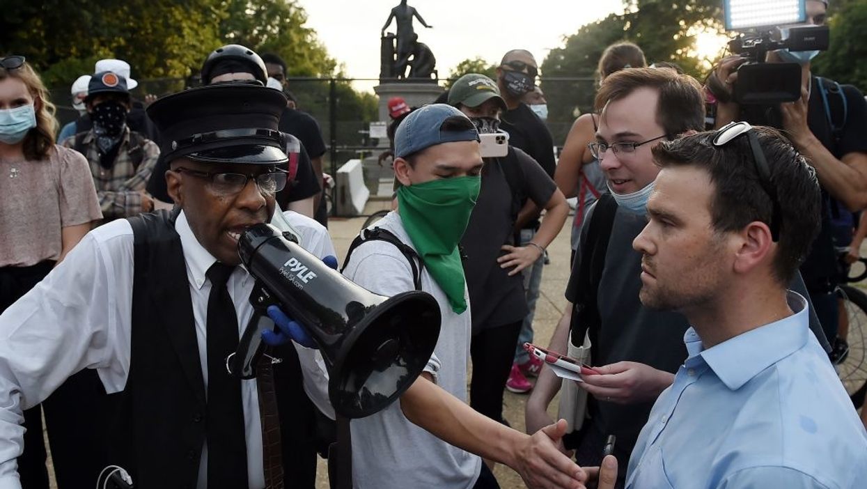 Hostilities flare at Emancipation Memorial, black man slams protesters: 'Y’all don’t know the history of this statue'