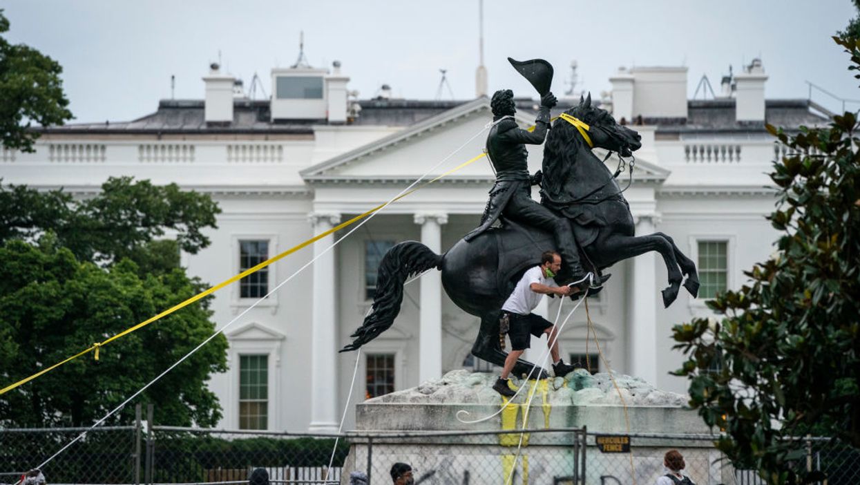 Four men face federal charges for trying to tear down Andrew Jackson statue after Trump signed order to protect monuments