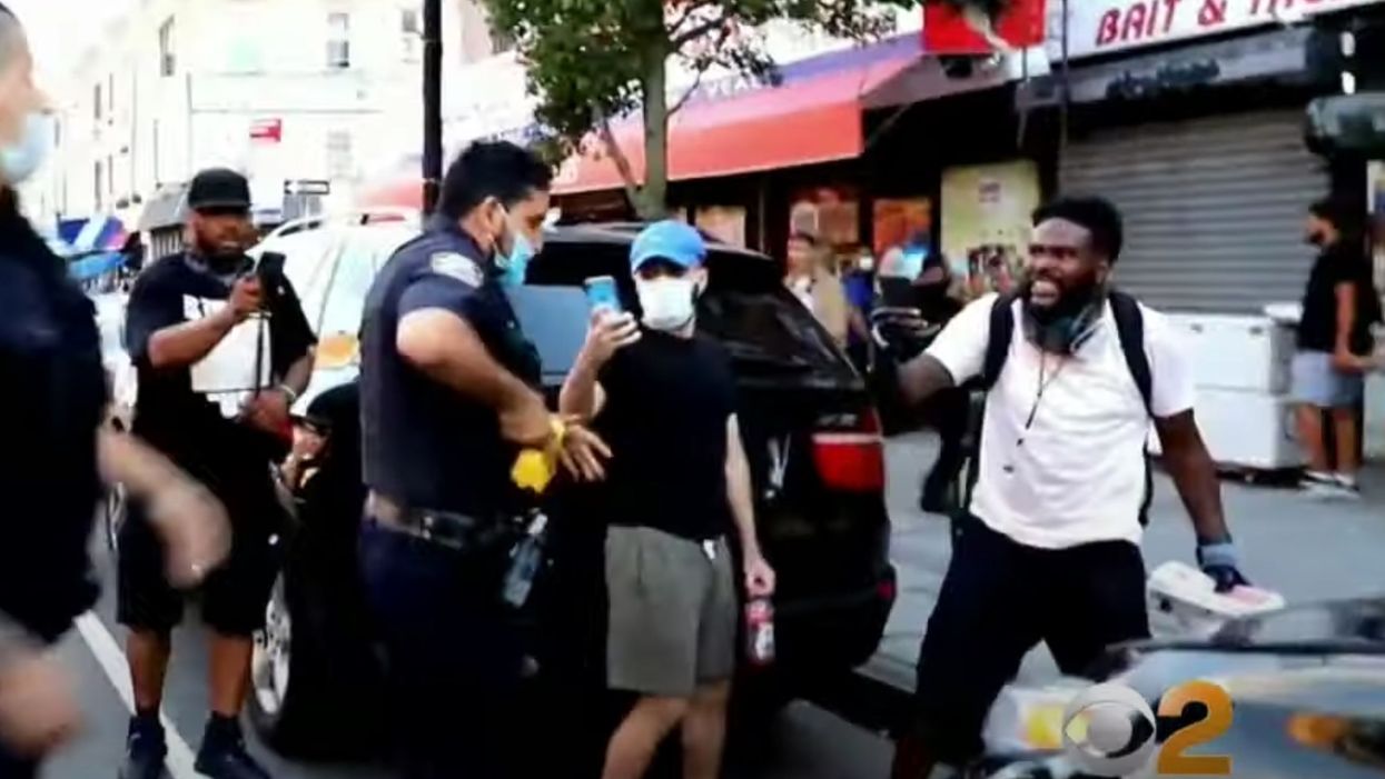 Outrage erupts over video of NYPD cop tasing Black Lives Matter protester. Police say the video doesn't tell the full story.