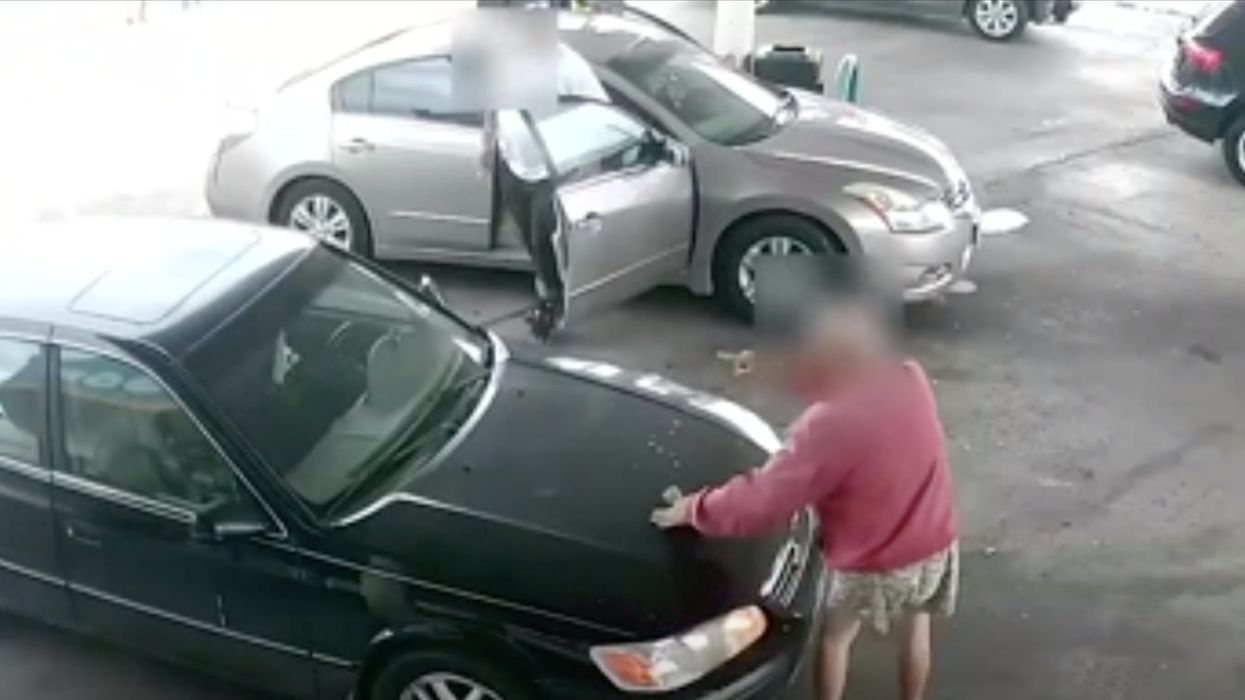 Graphic video captures the moment on-the-loose assault suspect plows through elderly man while stealing the victim's car