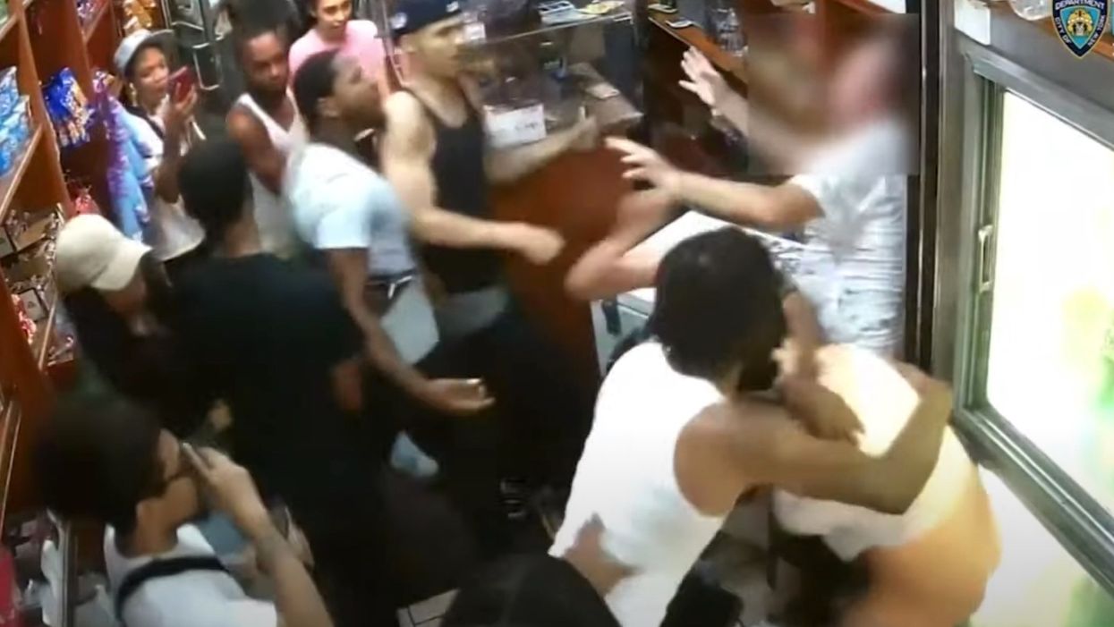 Surveillance video captures mob brutally beating a father and his daughter inside a NYC bodega