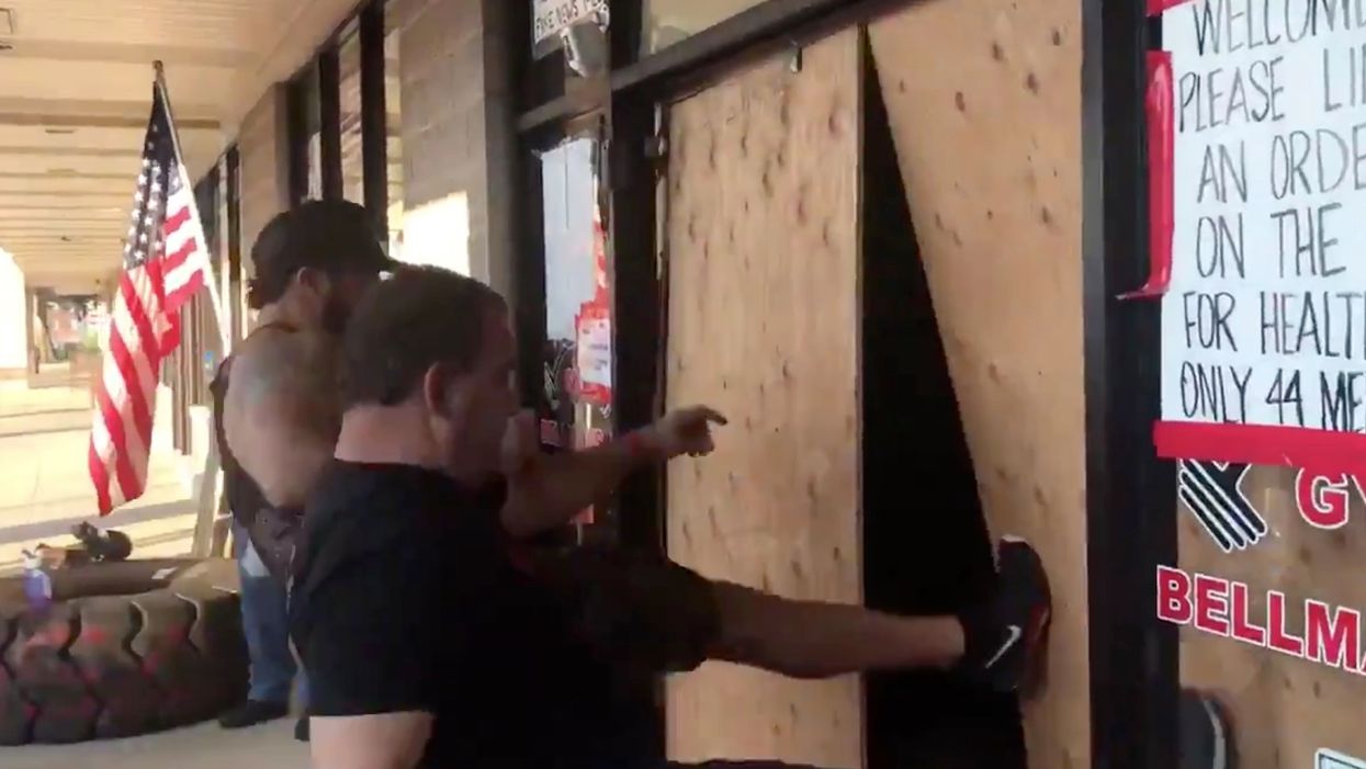 New Jersey gym owners, who were arrested for defying shutdown, kick down gov't-installed barriers to reopen