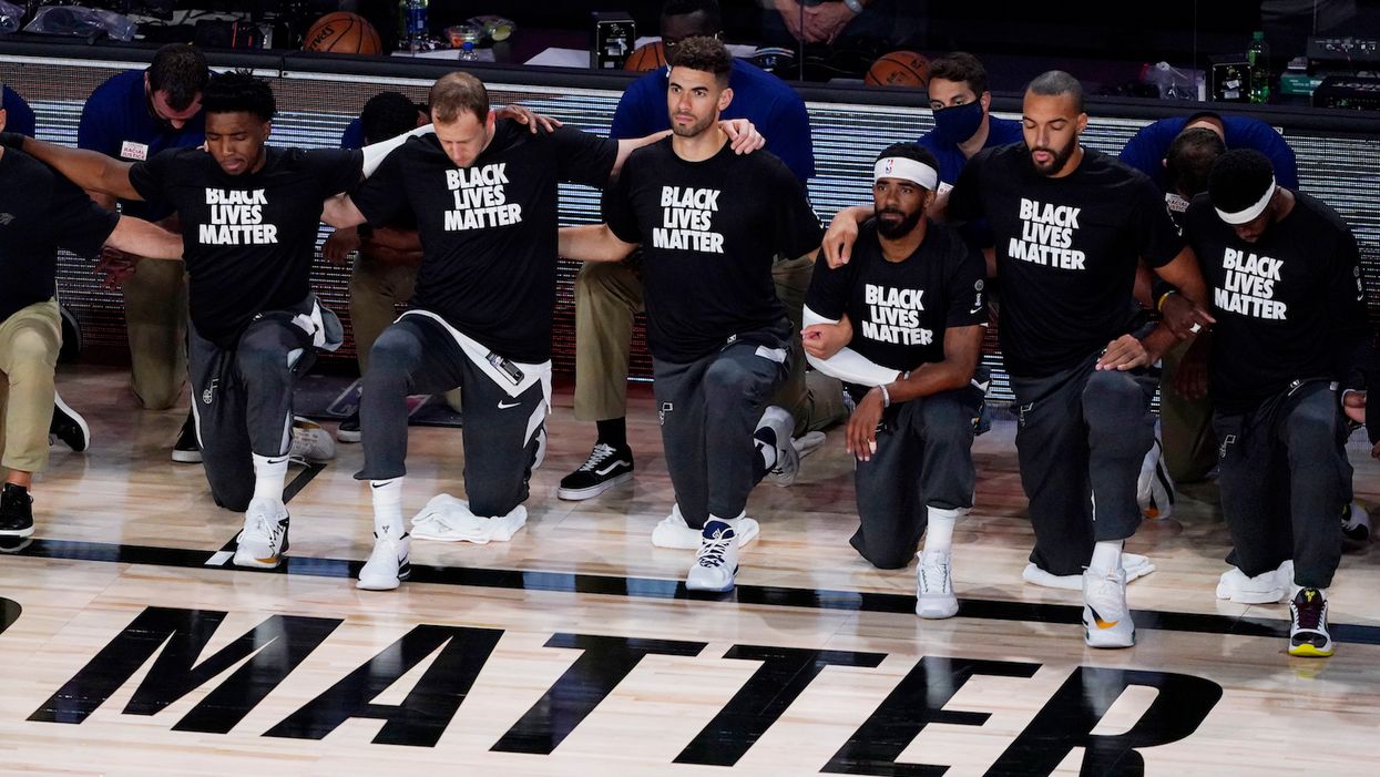 Oklahoma City Thunder players kneel during anthem even after threat from GOP congressman