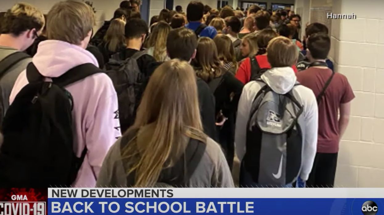 Two students say school suspended them for circulating photos of overcrowded school hallways amid COVID-19