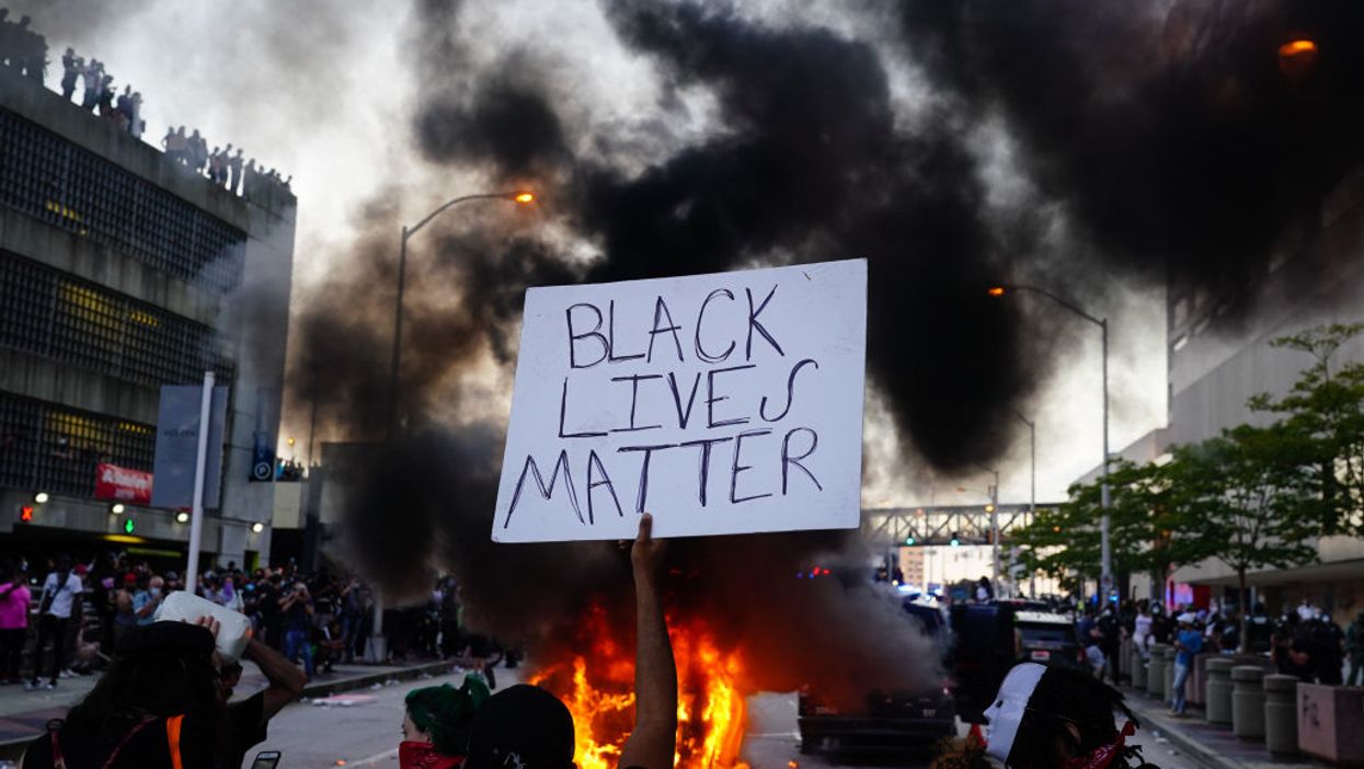 Black Lives Matter protesters in Seattle demand white residents 'give up' their homes