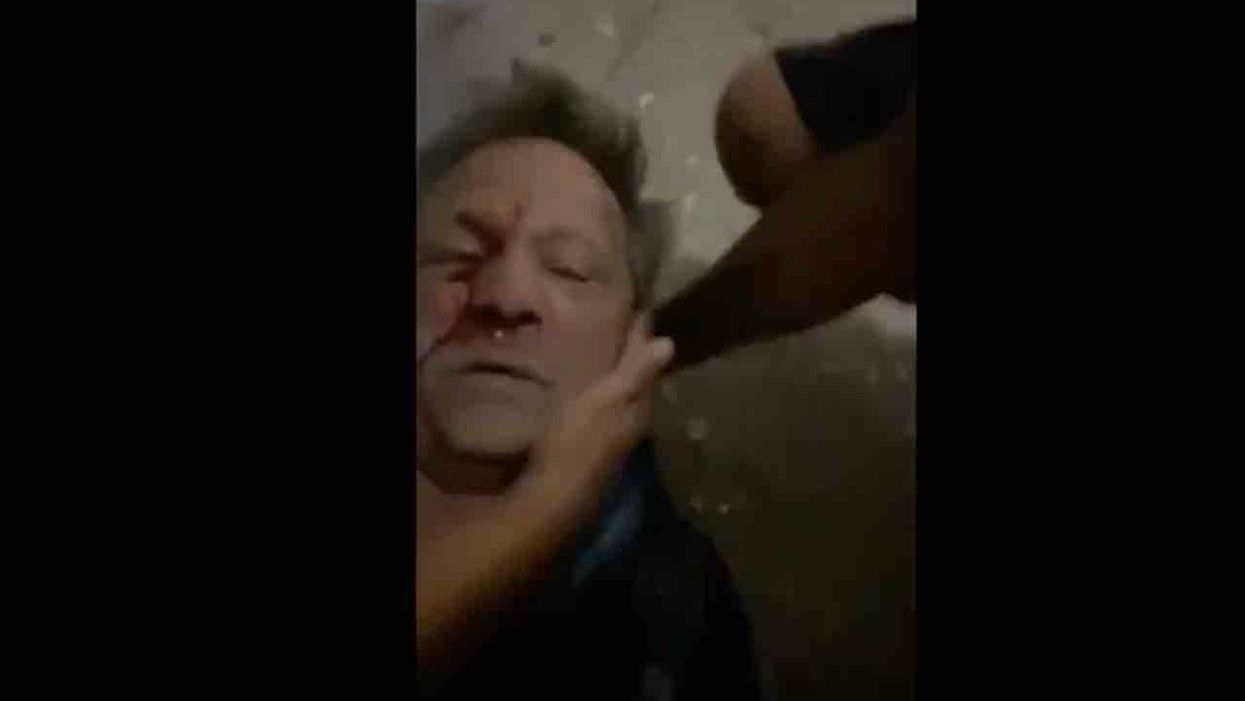 VIDEO: Elderly man tries to defend burning Kenosha business from looters — so thug flattens him, bloodies his face