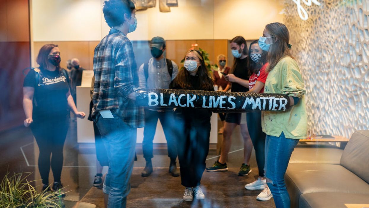 Black Lives Matter protesters chain themselves together in lobby of Mayor Ted Wheeler's condo, riots erupt in Portland