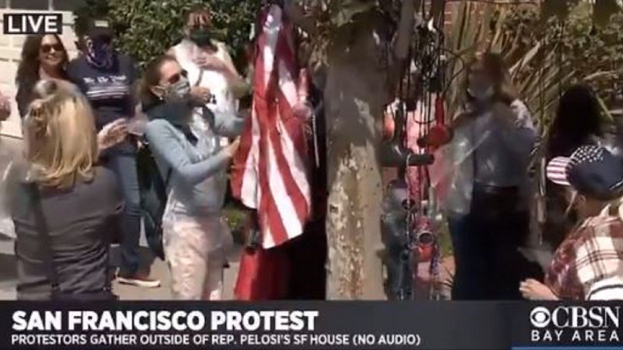 Protesters hang hair dryers on tree outside Pelosi's house amid salon uproar