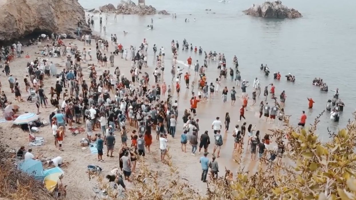 Nearly 1,000 people flock to California beach to get baptized Saturday