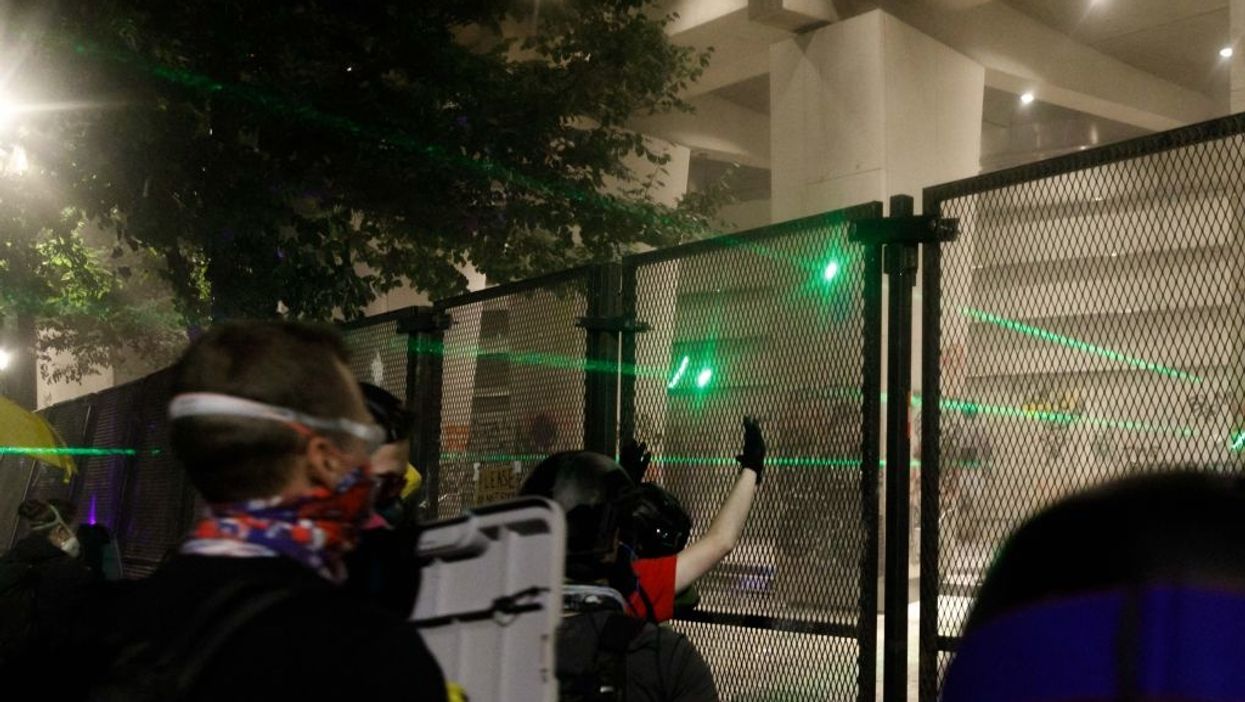 Portland rioter who shined high intensity laser into police officer's eyes charged on multiple felony counts