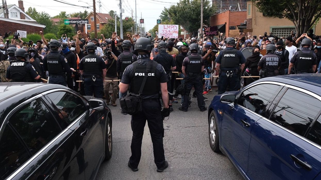 Two police officers shot during violent protests in Louisville over Breonna Taylor