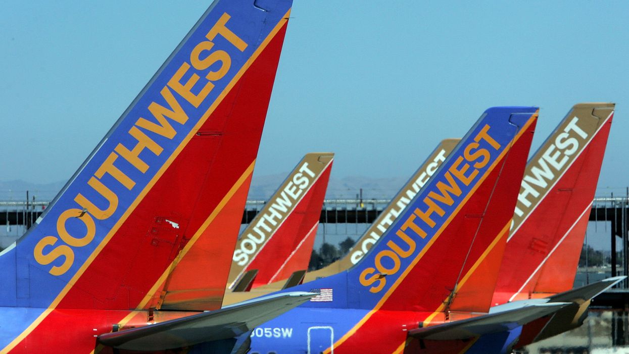 Woman says Southwest Airlines staff refused to board her over 'lewd, obscene, and offensive' shirt that exposed much of her chest