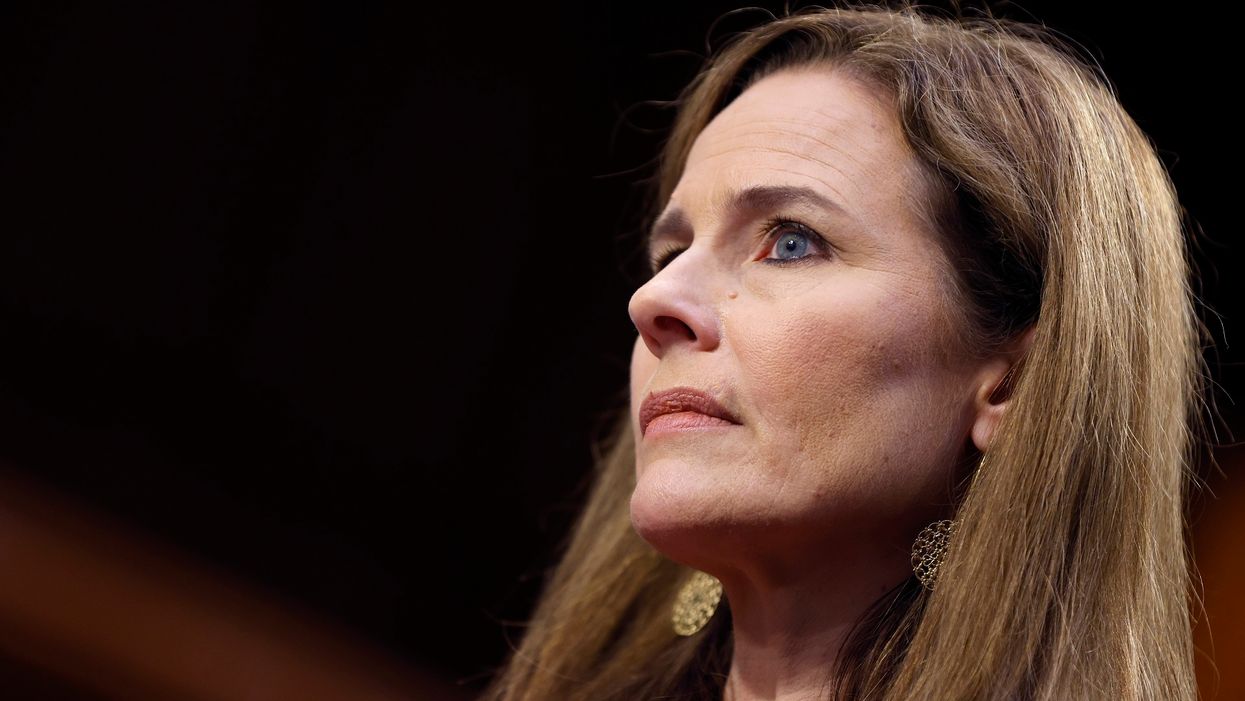 Watch: Amy Coney Barrett reacts to attack on her for adopting black children