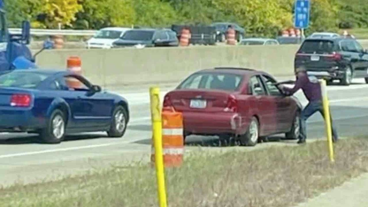 Man points rifle at motorist in apparent road rage incident. But motorist grabs his own gun — and pulls trigger.