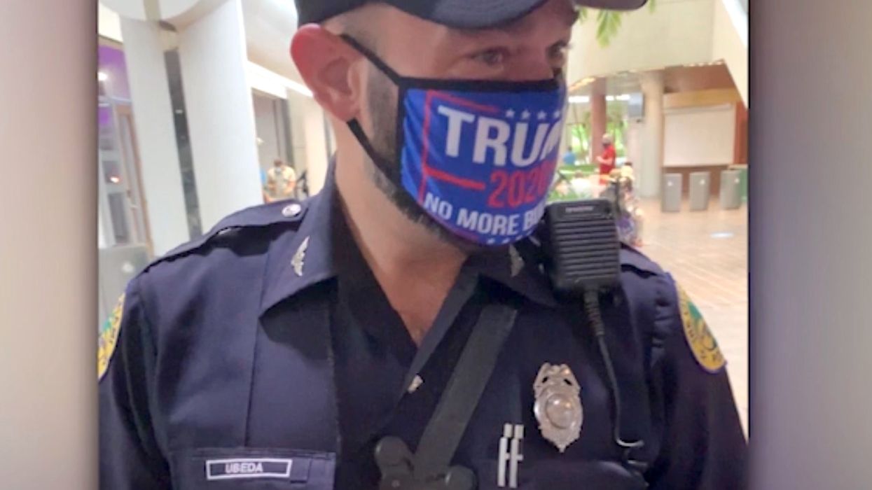 Miami police officer will be disciplined after wearing a 2020 Trump face mask at voting site while in uniform