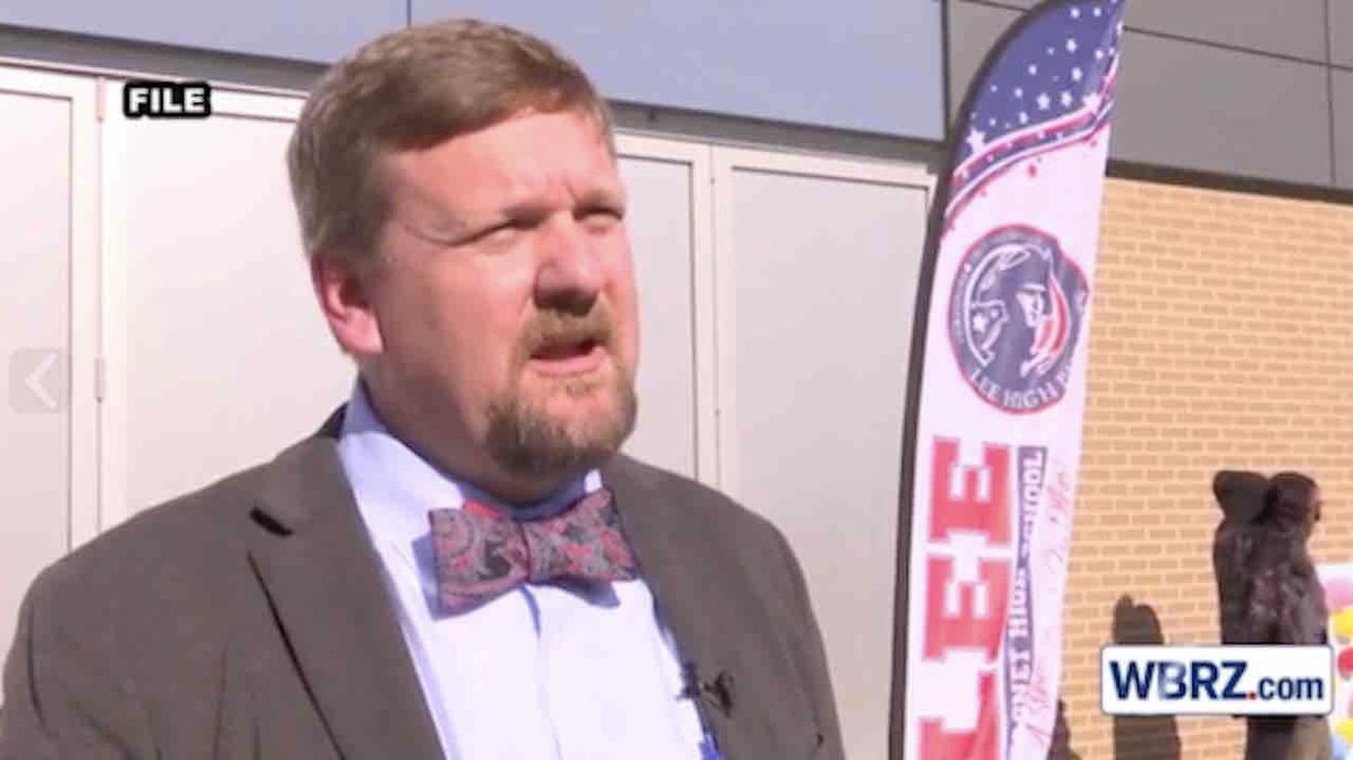 HS principal allegedly says football players should stand for national anthem or quit team. Now he's on leave.