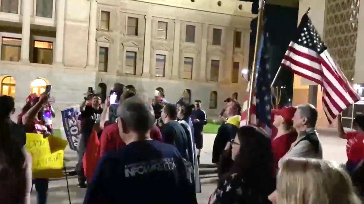Hundreds of Trump supporters chant 'four more years' at protest in Arizona Capitol as election count continues