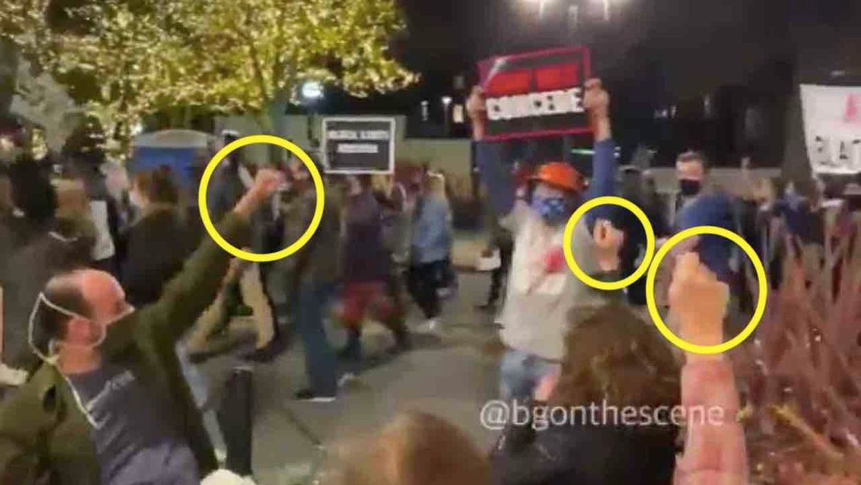 VIDEO: Black Lives Matter militants march by outdoor diners — who make absolutely sure their fists are raised in solidarity