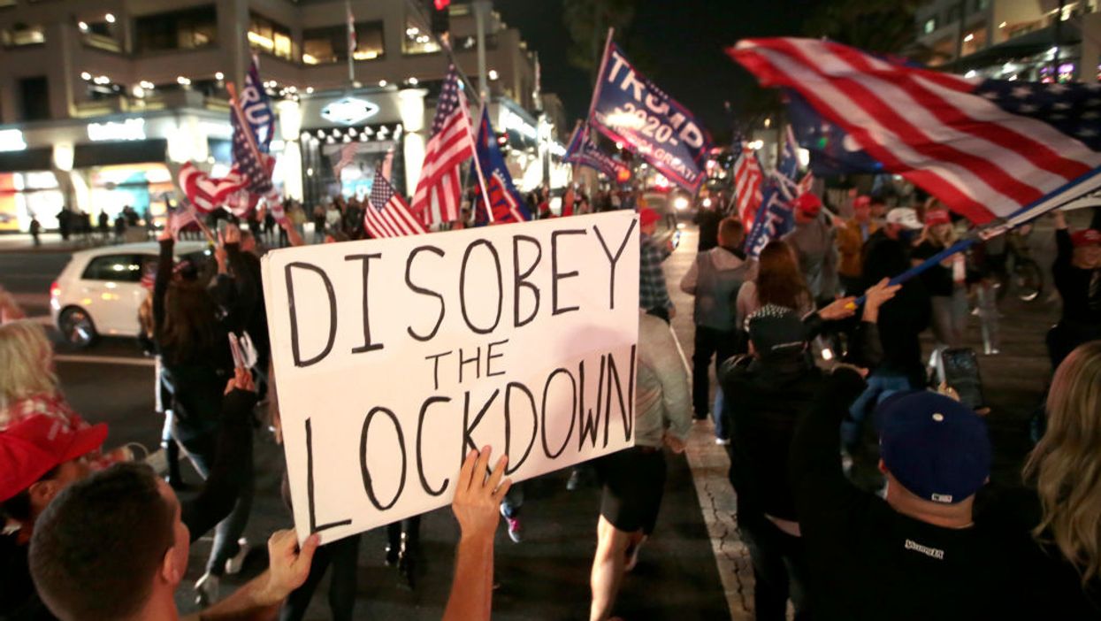 VIDEO: Protesters in Huntington Beach fight back against Newsom's curfew and California lockdowns