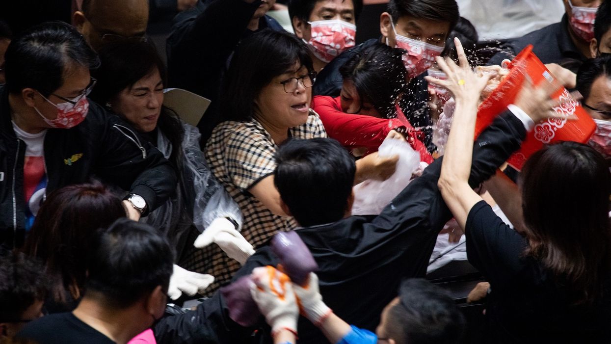 Taiwanese lawmakers hurl pig organs in Parliament during brawl over US meat imports