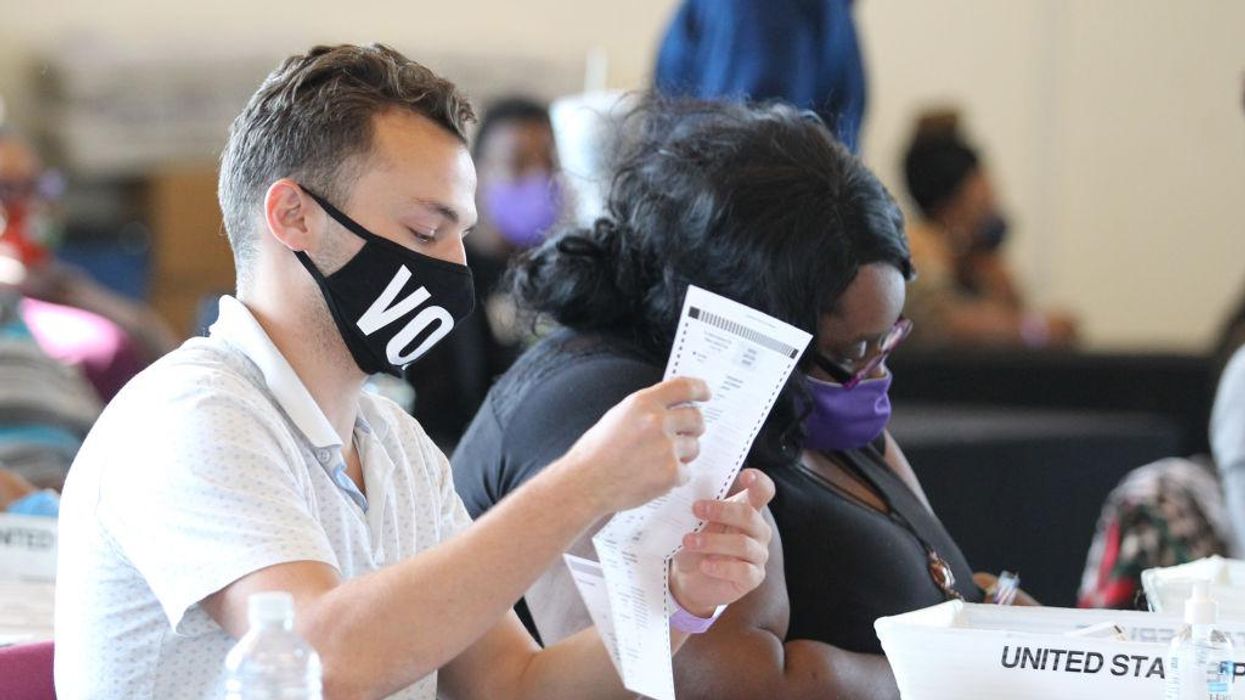 Georgia election officials refute claims made about viral video with 'suitcases' of ballots