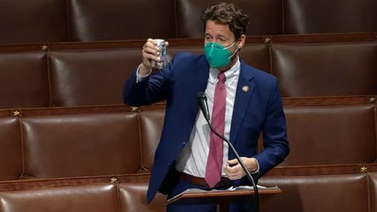 Outgoing Democratic congressman cracks a beer on House floor in farewell speech