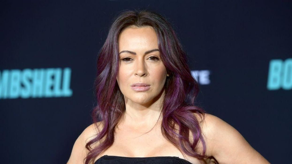 Alyssa Milano slammed as #MeToo 'hypocrite' for fundraising for Raphael Warnock, who was involved in domestic dispute