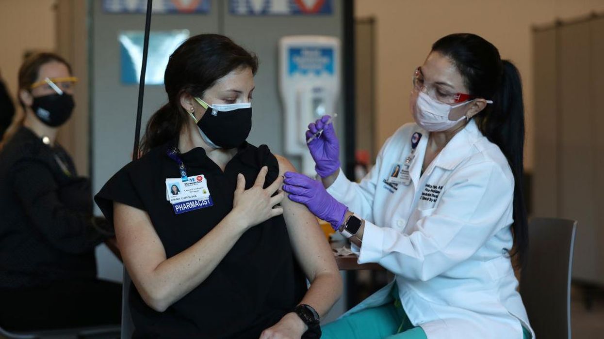 Large numbers of health care and frontline workers are refusing to get the coronavirus vaccine