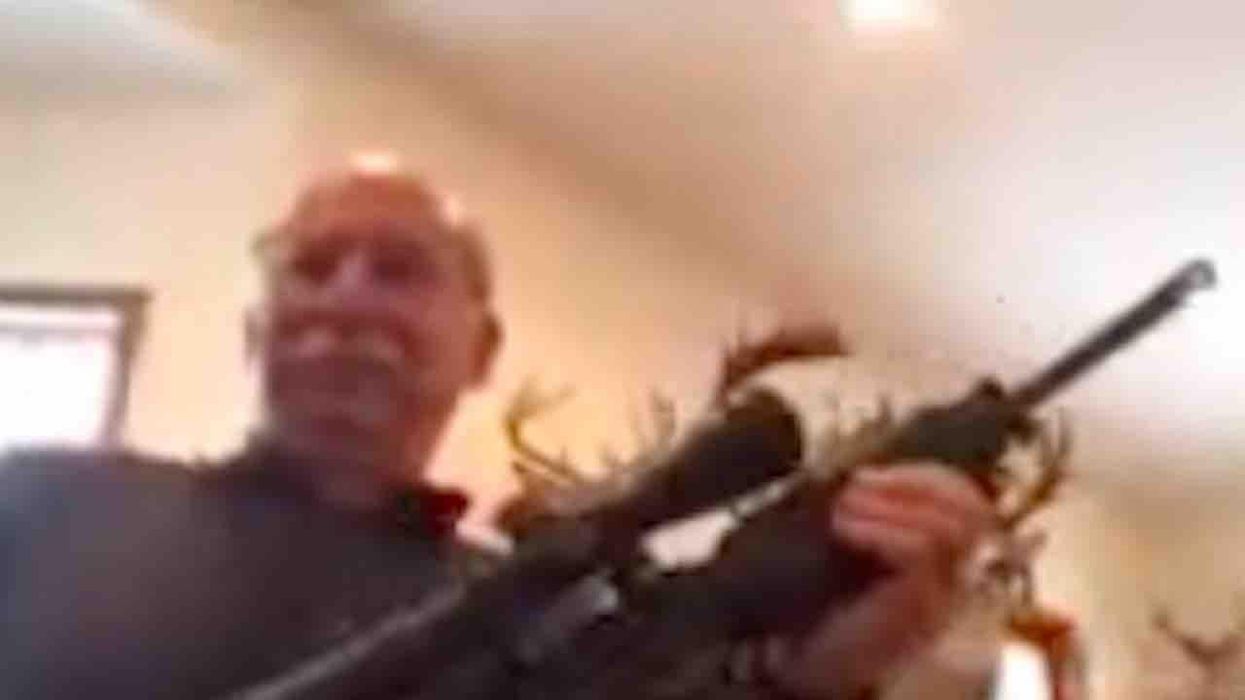 County official displays rifle during virtual public meeting after citizen complains about 'gun culture,' Proud Boys
