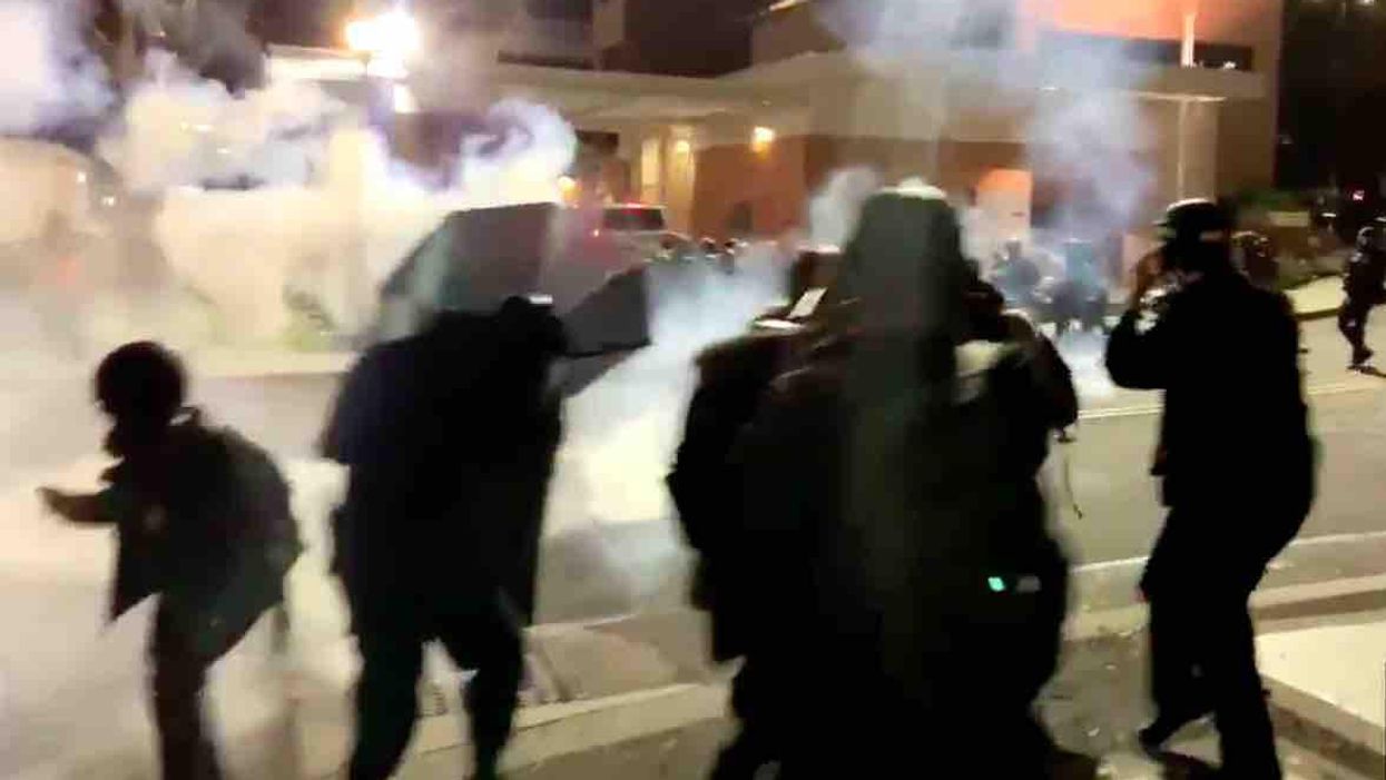 Antifa mob thinks it has cops retreating — until the tough leftists get pelted with flash bangs and tear gas