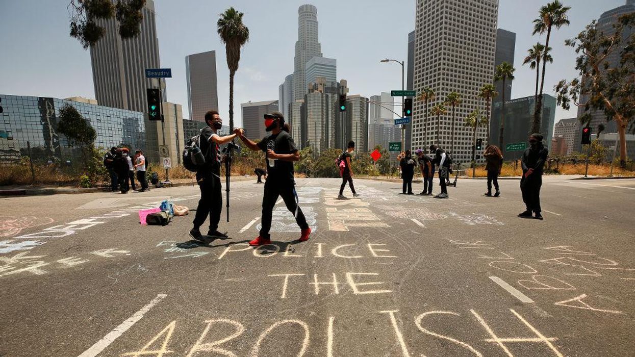 LA school board cuts one-third of police and replaces them with 'climate coaches'