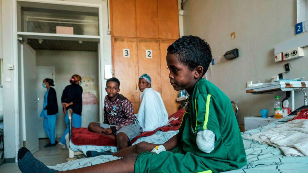 International outrage builds after multiple reports accuse Eritrean troops of massacring 'many hundreds' of Ethiopian civilians last year