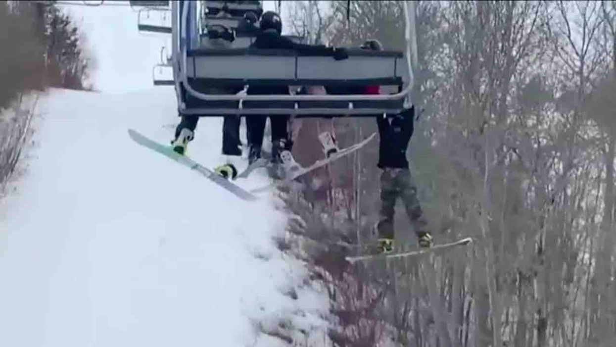 VIDEO: Boy slips off chairlift, grabs edge, dangles above the slopes — and all witnesses can do is shout encouragement for him to hold on